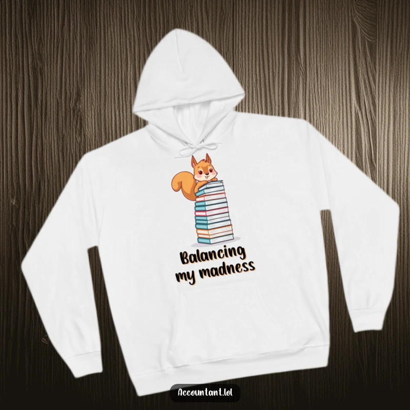 Funny hoodie with a playful squirrel balancing a precarious stack of financial ledgers, offering warm and humorous finance-themed comfort.