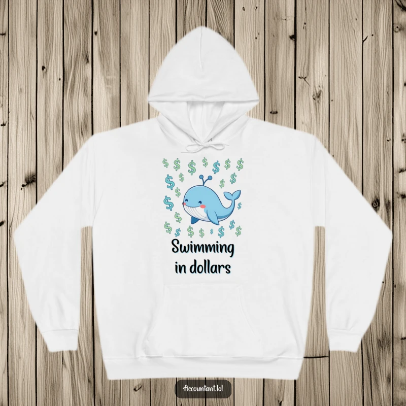 Funny smiling blue whale swimming through a sea of floating dollar signs, featured on a warm hoodie.