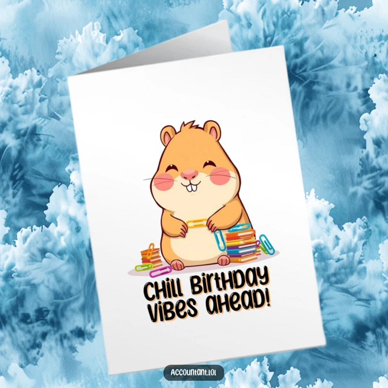 Funny Free Printable Birthday Card: A serene capybara smiles gently while meticulously arranging colorful paper clips, bringing calm humor.